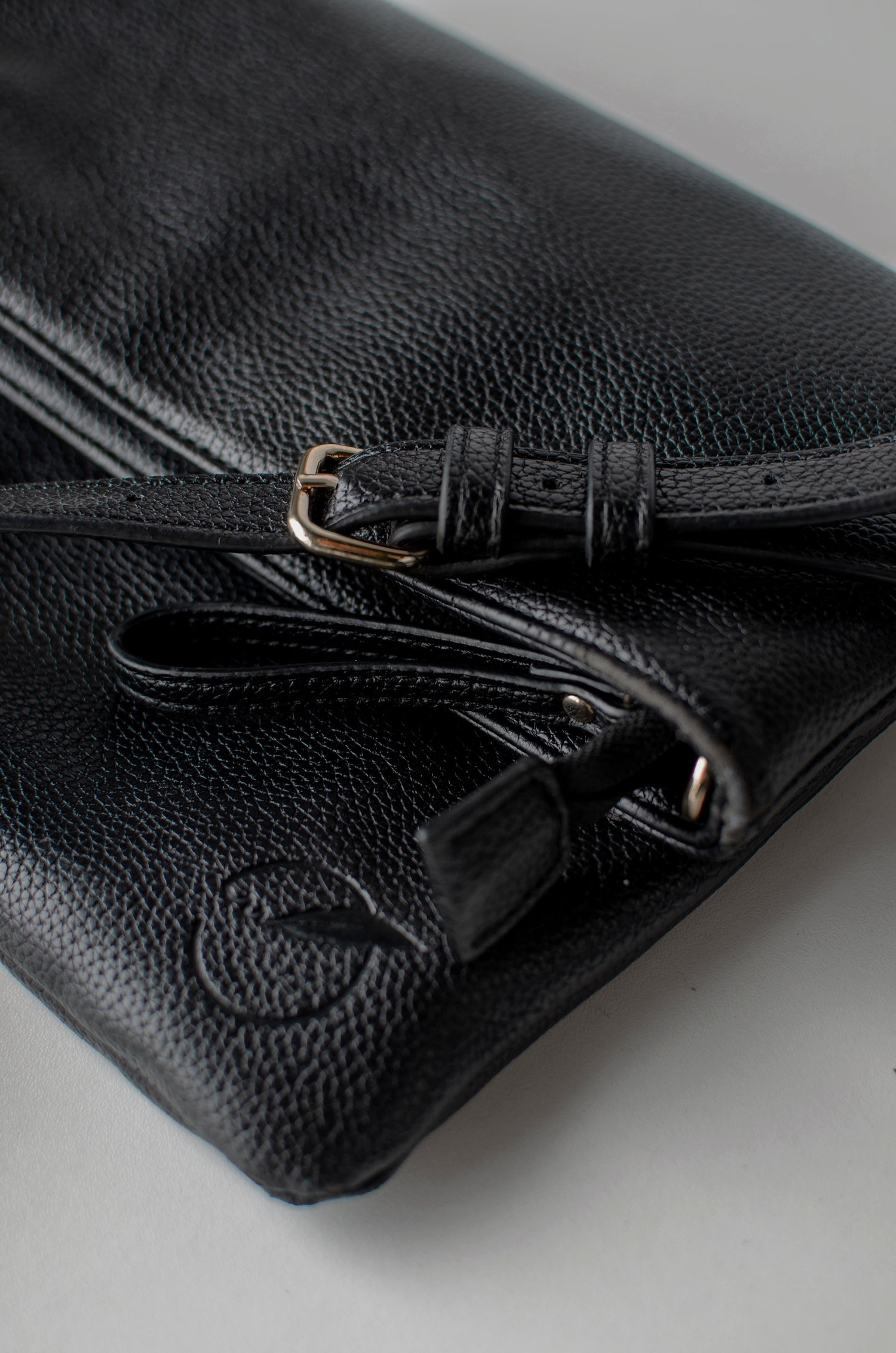1. "Zoomed-in image capturing the elegant stitching and premium texture of an After Story luxury handbag, designed for style-conscious professionals